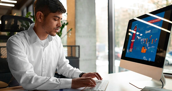 Developer working at a professional office setup